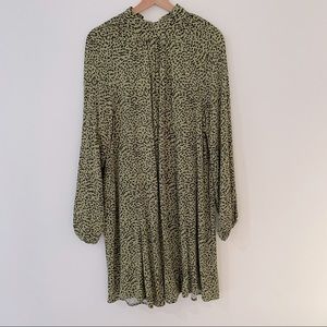 Green and black midi dress